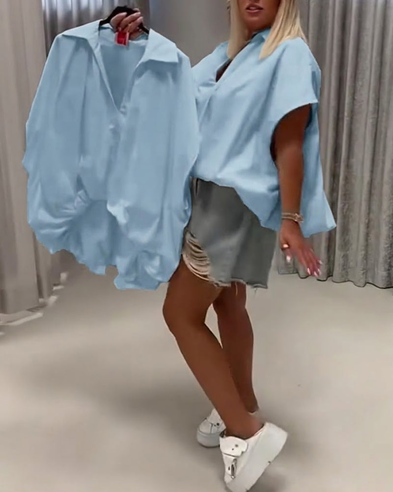 BLUSA CUELLO CORTE HOLGADO MANGA MURCIÉLAGO