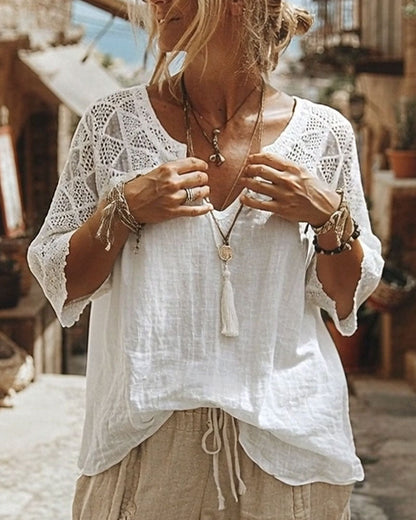 BLUSA LISA CON PANELES CUELLO DE V