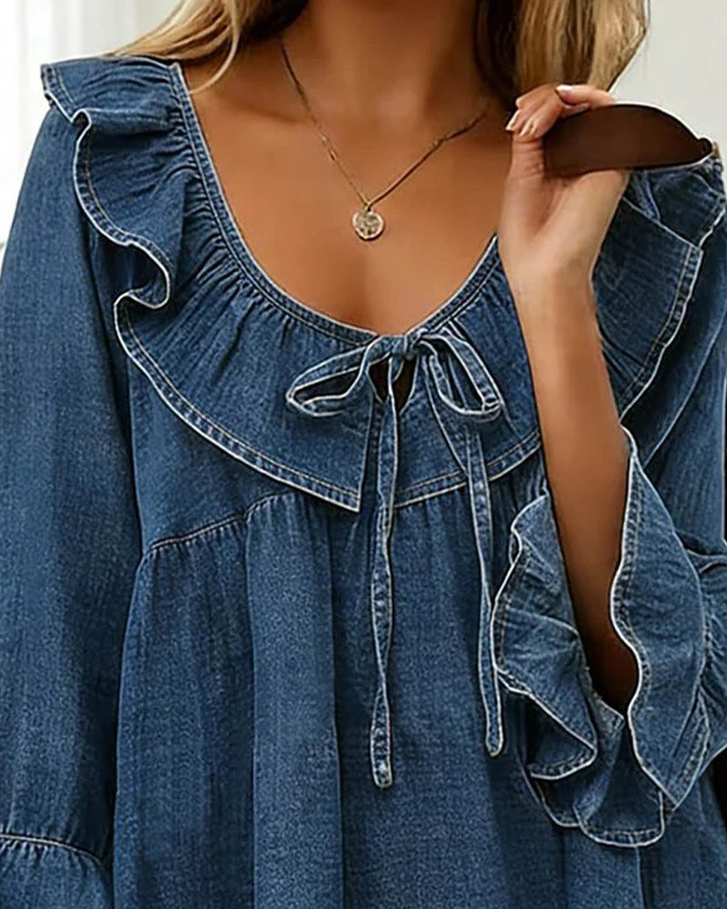 BLUSA CON LAZO CON VOLANTES DE DENIM CUELLO REDONDO