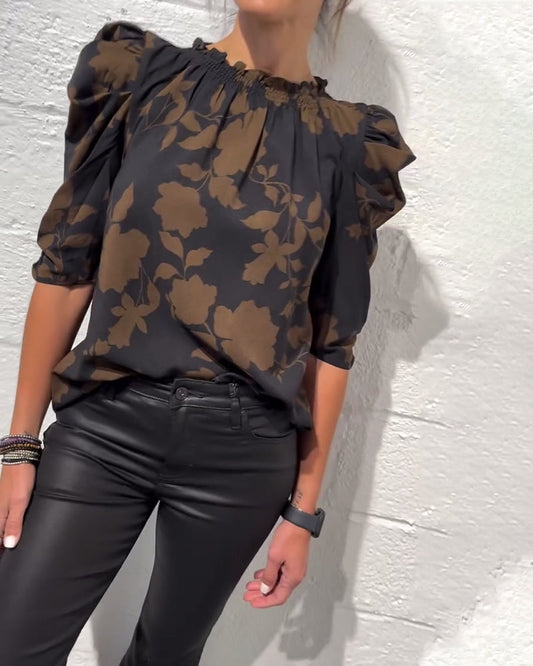 BLUSA MANGA ABULLONADA VOLANTE
