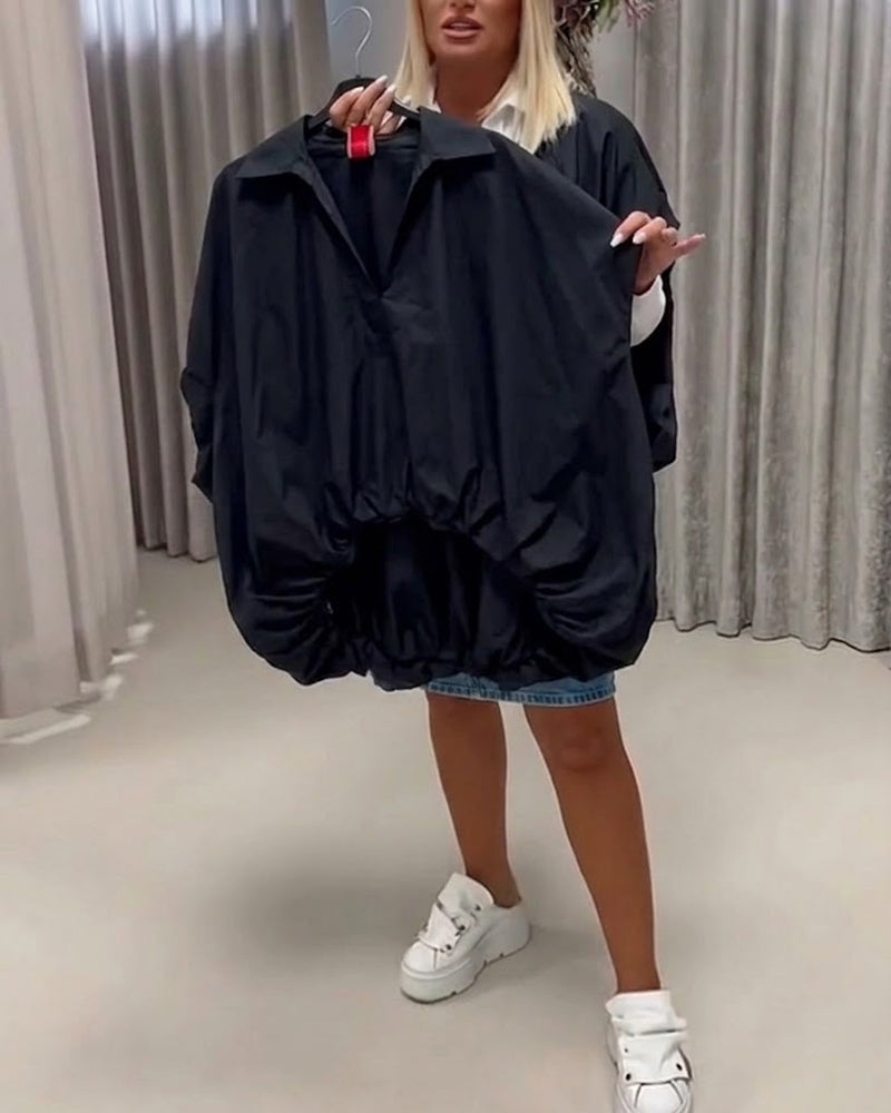 BLUSA CUELLO CORTE HOLGADO MANGA MURCIÉLAGO