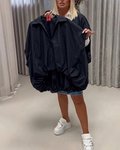 BLUSA CUELLO CORTE HOLGADO MANGA MURCIÉLAGO