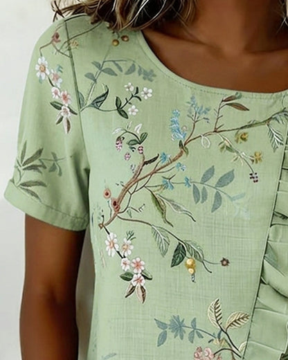 BLUSA CUELLO REDONDO MANGA CORTA CON VOLANTES FLORAL