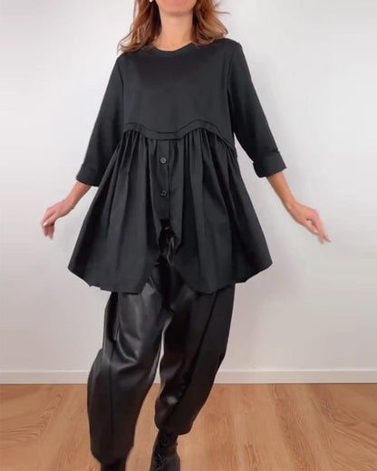 BLUSA LÍNEA A ASIMÉTRICA PLISADO