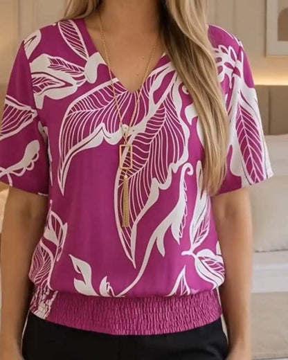 BLUSA ESTAMPADO FLORAL BAJO ELÁSTICO MANGA CORTA