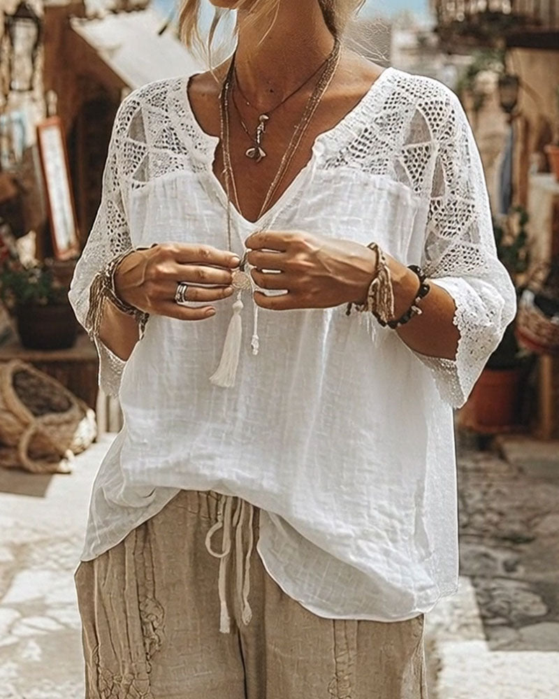 BLUSA LISA CON PANELES CUELLO DE V