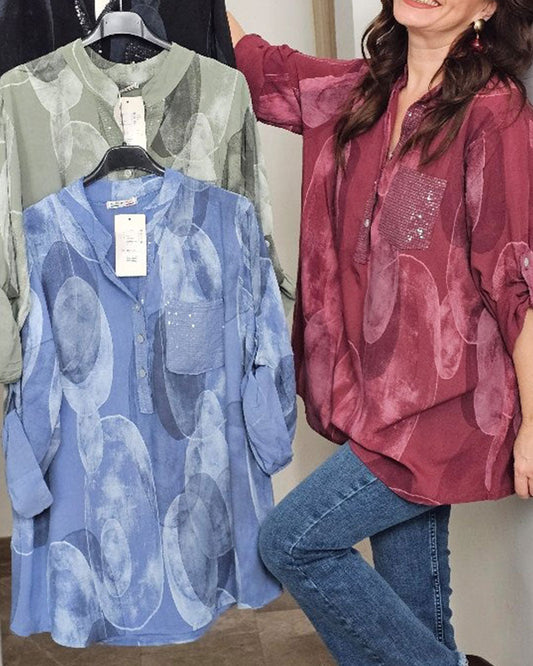 BLUSA ABOTONADA ESTAMPADA BOLSILLO