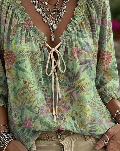 BLUSA CUELLO DE V CON CORDONES