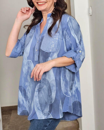BLUSA ABOTONADA ESTAMPADA BOLSILLO