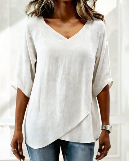 TOP BAJO ASIMÉTRICO LISO CUELLO DE V