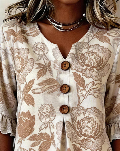 BLUSA ESTAMPADA PUÑO CON VOLANTES