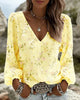BLUSA FLORAL CUELLO DE V MANGAS ABULLONADAS