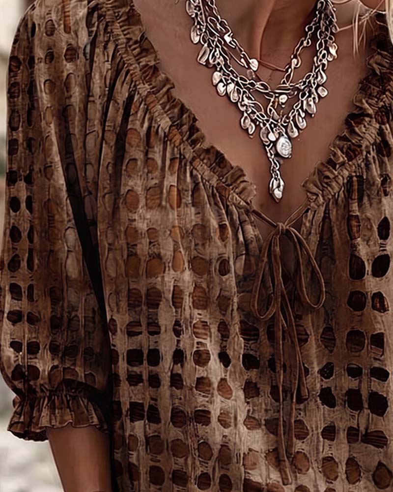 BLUSA DE LUNARES CON CORDONES