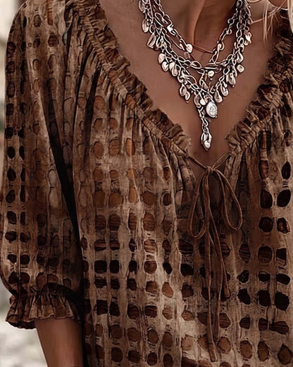 BLUSA DE LUNARES CON CORDONES