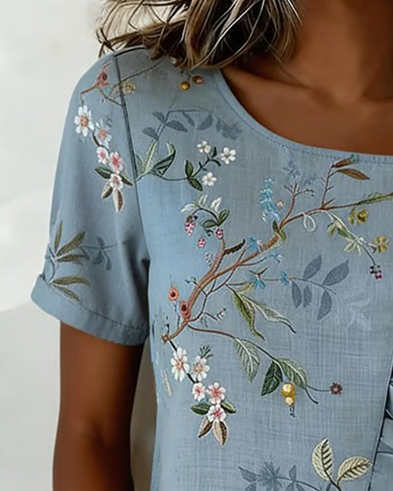BLUSA CUELLO REDONDO MANGA CORTA CON VOLANTES FLORAL