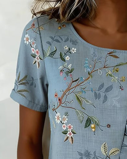 BLUSA CUELLO REDONDO MANGA CORTA CON VOLANTES FLORAL