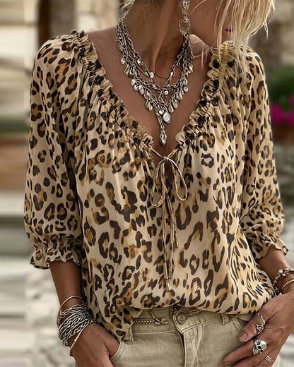 BLUSA ESTAMPADO DE LEOPARDO CUELLO DE V MANGAS ABULLONADAS CORDONES