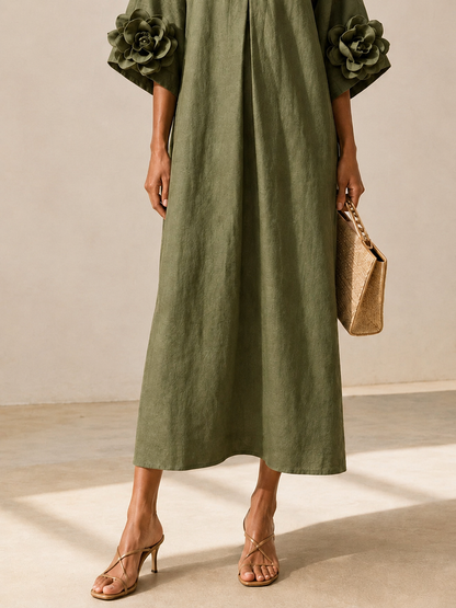 VESTIDO  VERDE OLIVA CON ESCOTE EN V Y MANGAS FLORALES LLAMATIVAS