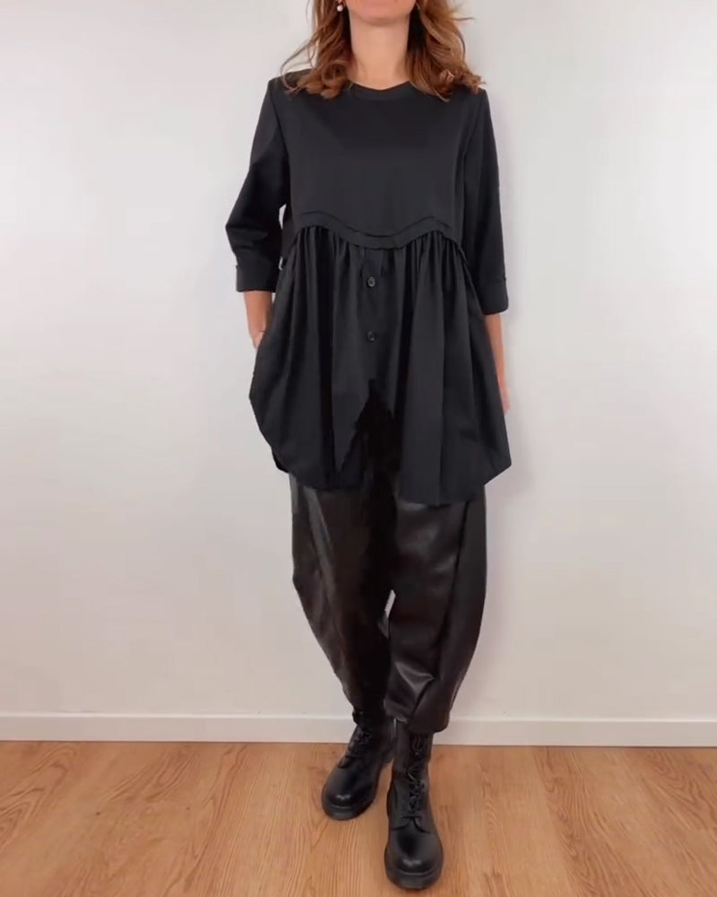 BLUSA LÍNEA A ASIMÉTRICA PLISADO