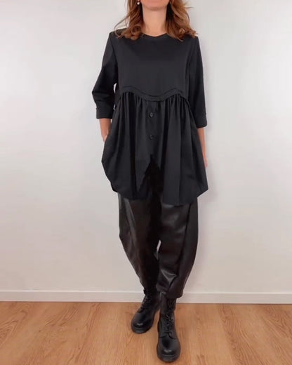 BLUSA LÍNEA A ASIMÉTRICA PLISADO