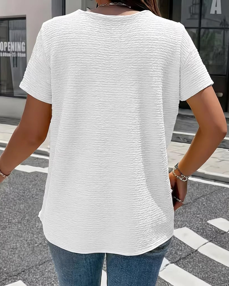 CAMISETA CUELLO PETER PAN TRES BOTONES