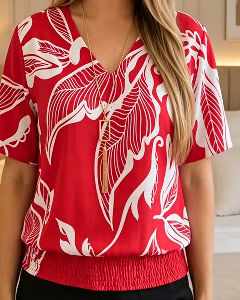 BLUSA ESTAMPADO FLORAL BAJO ELÁSTICO MANGA CORTA