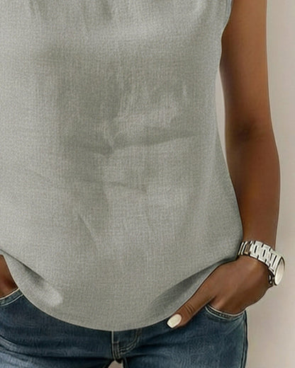 BLUSA SIN CUELLO SIN MANGAS ELEGANTE