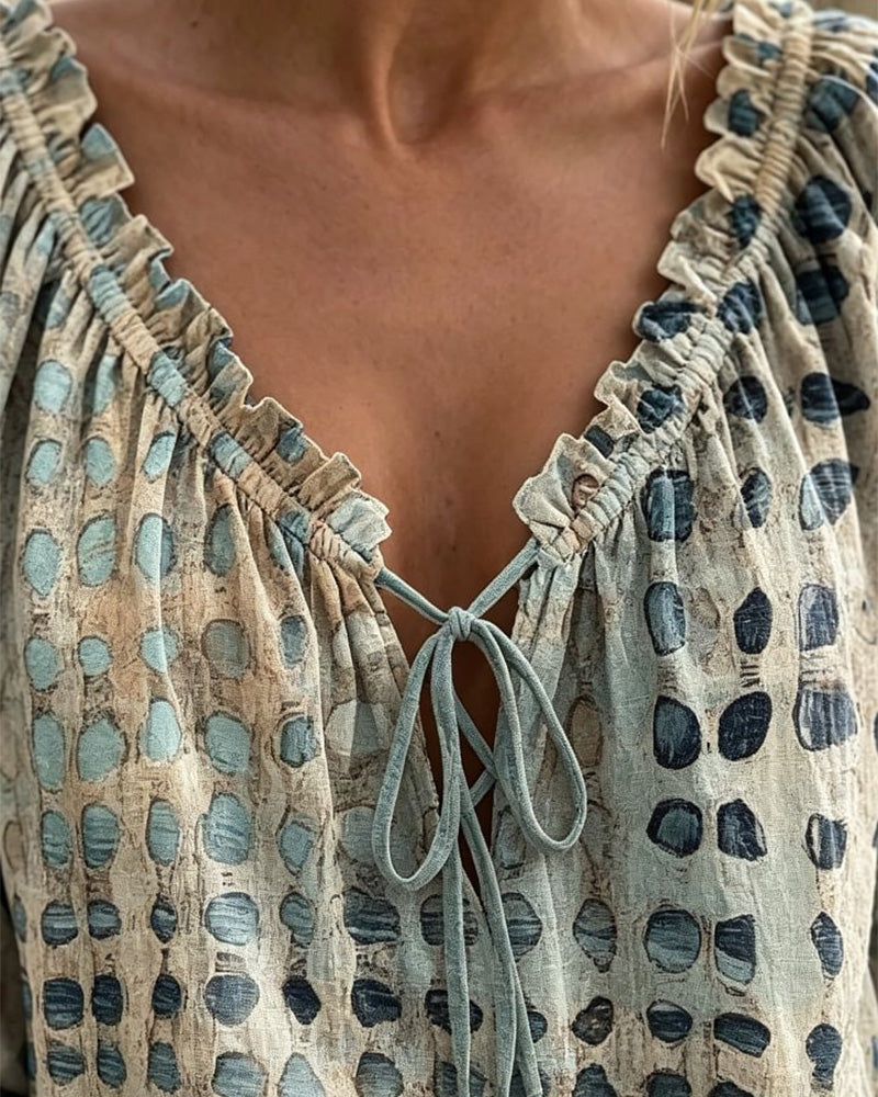 BLUSA DE LUNARES CON CORDONES