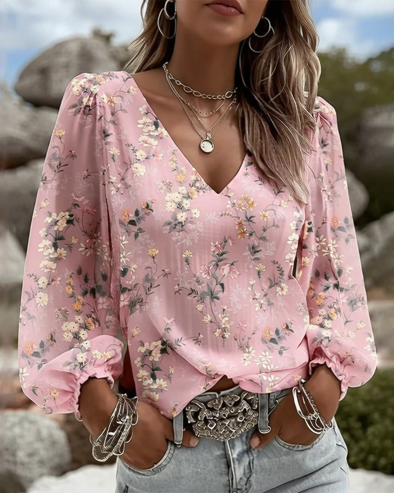 BLUSA FLORAL CUELLO DE V MANGAS ABULLONADAS