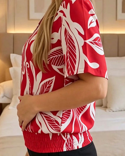 BLUSA ESTAMPADO FLORAL BAJO ELÁSTICO MANGA CORTA