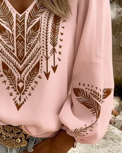 BLUSA MANGA ABULLONADA CUELLO DE V CORTE HOLGADO