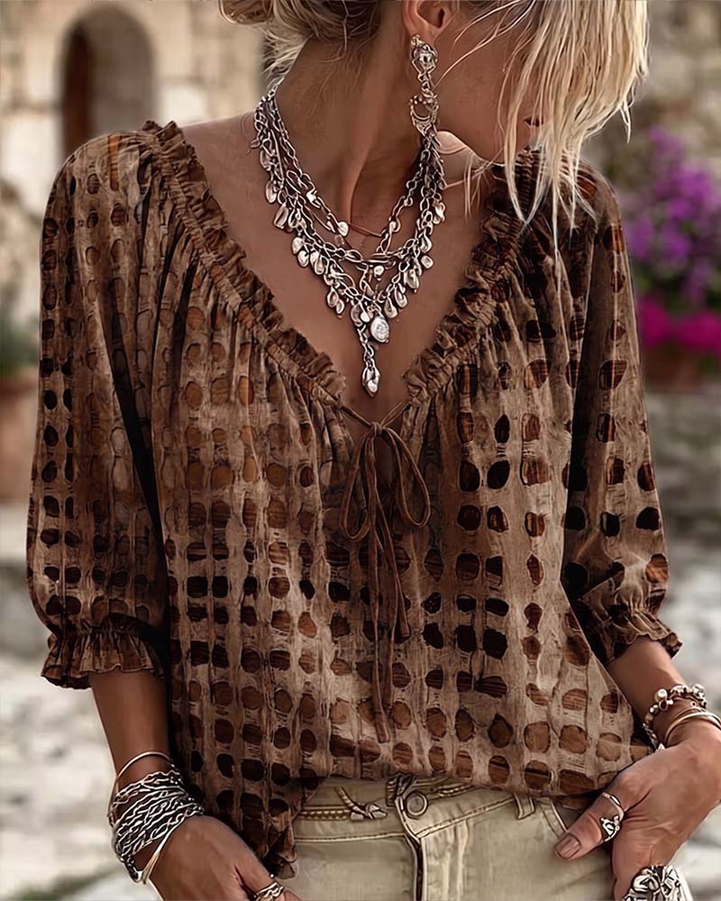 BLUSA DE LUNARES CON CORDONES