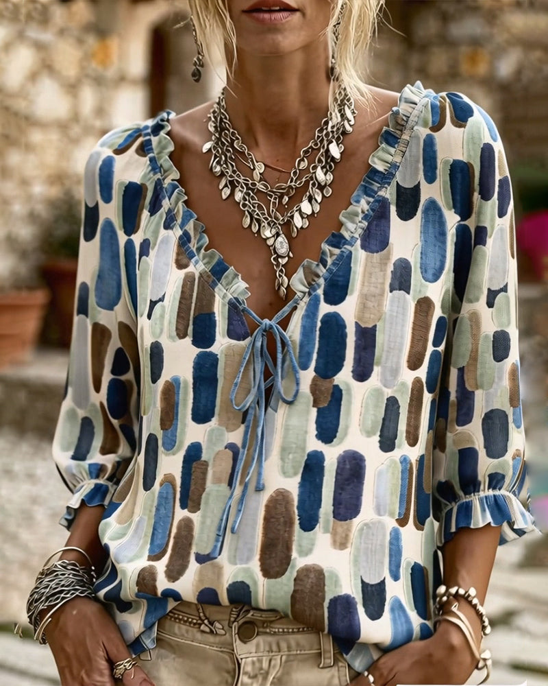 BLUSA BLOQUES DE COLOR VOLANTE ATADO CUELLO DE V