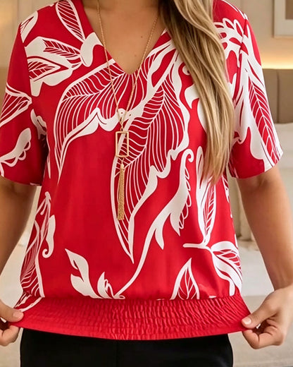 BLUSA ESTAMPADO FLORAL BAJO ELÁSTICO MANGA CORTA