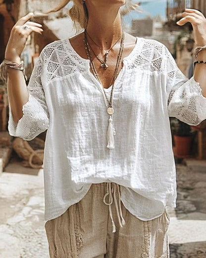 BLUSA LISA CON PANELES CUELLO DE V