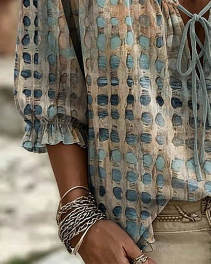 BLUSA DE LUNARES CON CORDONES