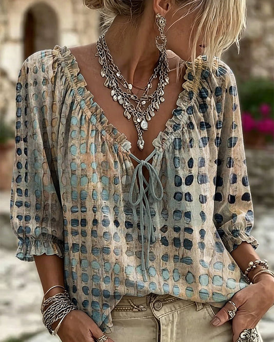 BLUSA DE LUNARES CON CORDONES