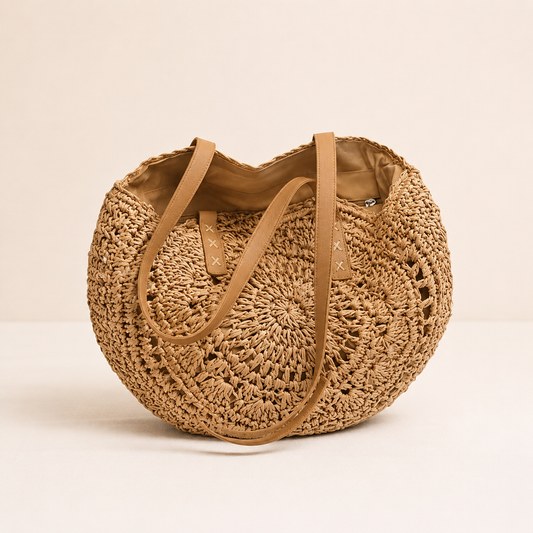 LOLA | BOLSO REDONDO DE PAJA TRENZADA CON DISEÑO — COÑAC