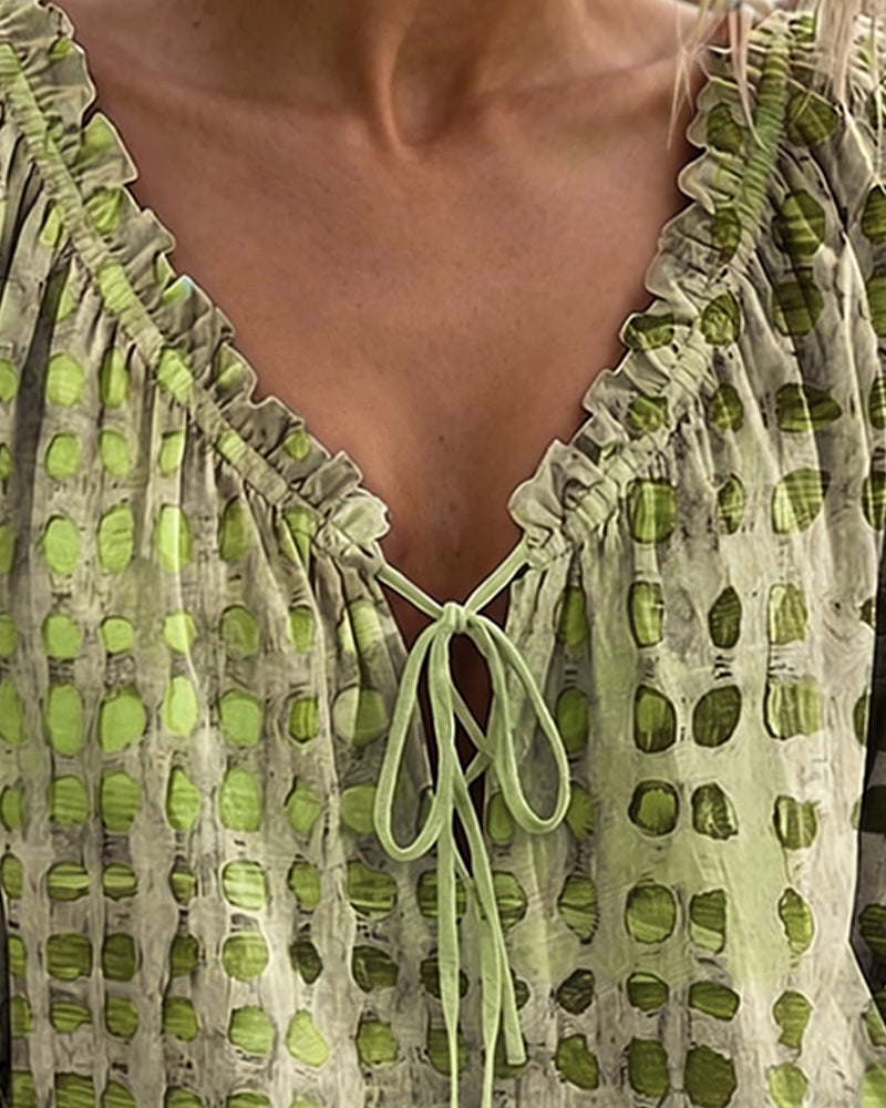 BLUSA DE LUNARES CON CORDONES