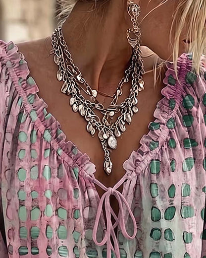 BLUSA DE LUNARES CON CORDONES