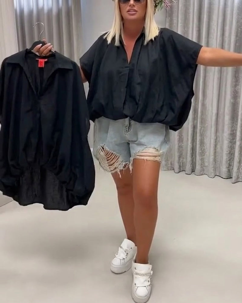 BLUSA CUELLO CORTE HOLGADO MANGA MURCIÉLAGO