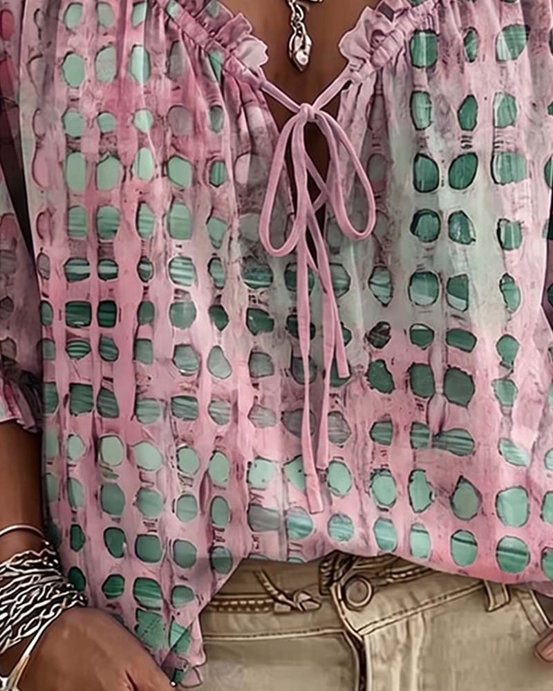 BLUSA DE LUNARES CON CORDONES