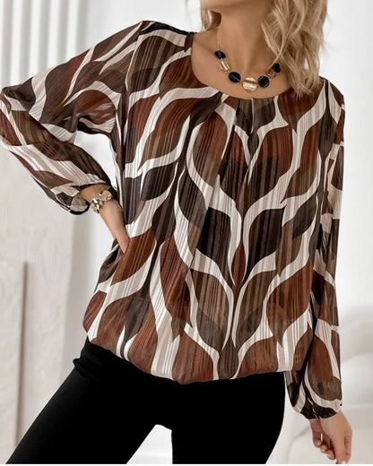BLUSA CON MANGAS GLOBO Y CUELLO REDONDO