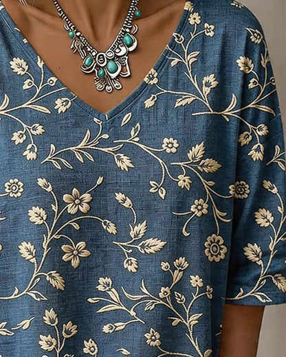 BLUSA CUELLO DE V MEDIO-MANGA FLORAL
