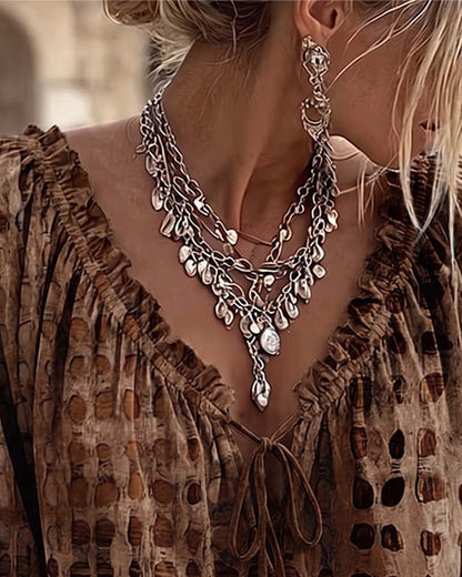 BLUSA DE LUNARES CON CORDONES