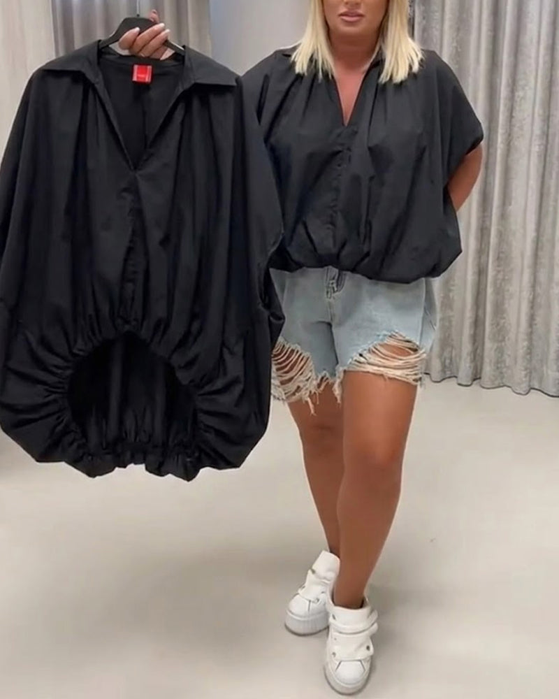 BLUSA CUELLO CORTE HOLGADO MANGA MURCIÉLAGO