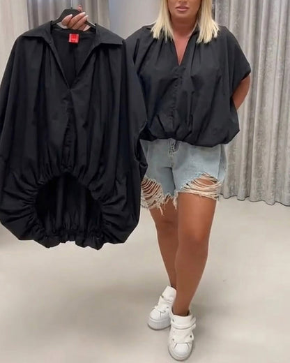 BLUSA CUELLO CORTE HOLGADO MANGA MURCIÉLAGO
