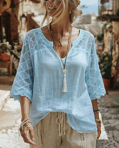 BLUSA LISA CON PANELES CUELLO DE V