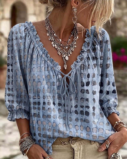 BLUSA DE LUNARES CON CORDONES