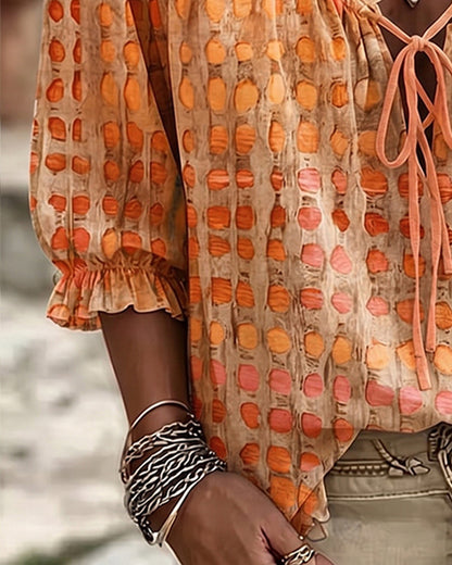 BLUSA DE LUNARES CON CORDONES